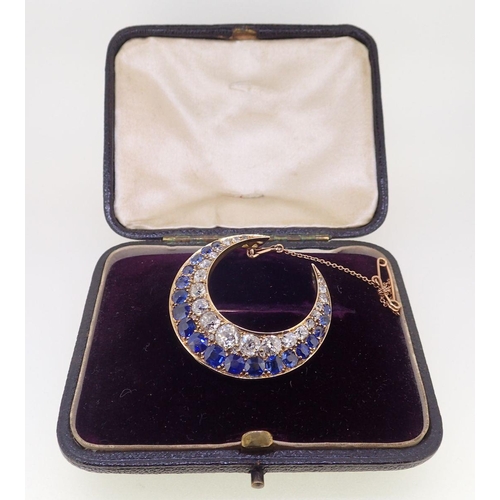 410 - A fine 18 carat gold crescent moon brooch set graduated sapphires and diamonds, 3.8 x 3.6cm, the lar... 