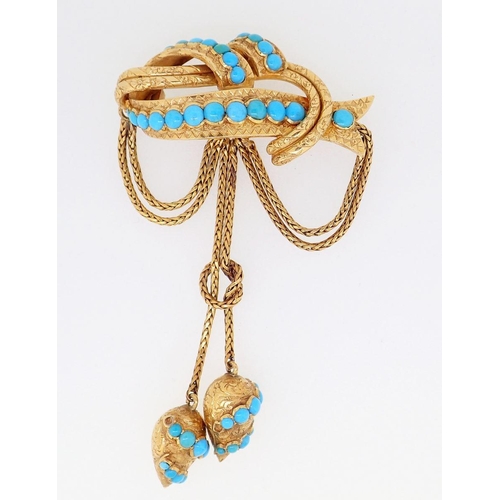 411 - A Victorian gold large pendant brooch set turquoise, the entwined ribbon and bar with double chain s... 