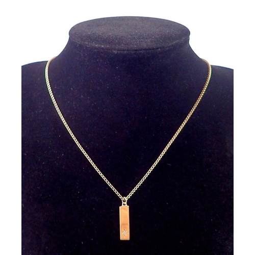 427 - A 9 carat gold miniature diamond set ingot 2.2cm  on 9 carat gold chain, 4.2g 38cm long