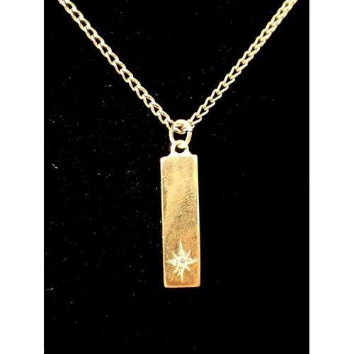 427 - A 9 carat gold miniature diamond set ingot 2.2cm  on 9 carat gold chain, 4.2g 38cm long