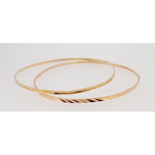 442 - Two 9 ct gold bangles, 4.7g