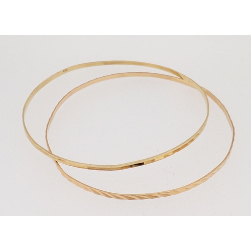 442 - Two 9 ct gold bangles, 4.7g