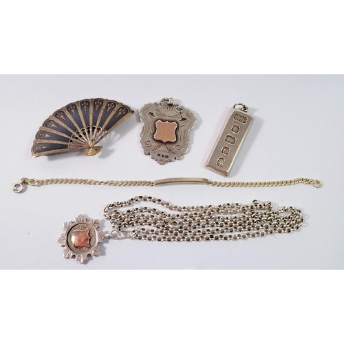 474 - Two silver sports medals, silver ingot, identity bracelet and silver Siam brooch, 81g