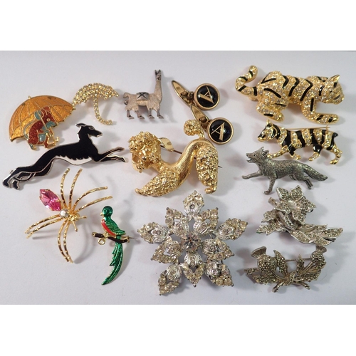 480 - A group of costume jewellery including animal brooches, marcasite, paste and Essex crystal 'A' cuffl... 