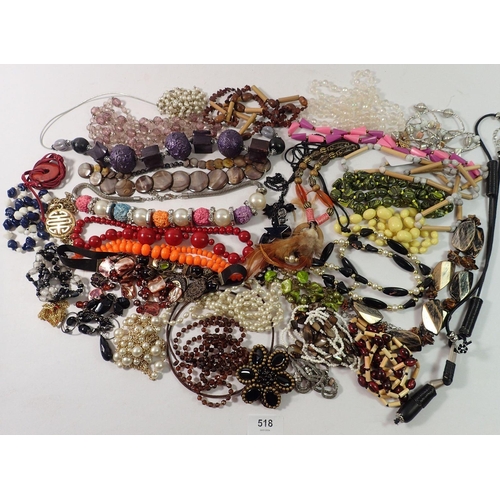 518 - A quantity of long bead necklaces