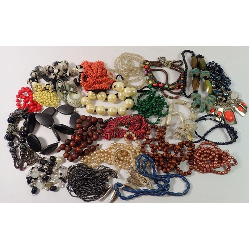 519 - A quantity of long bead necklaces