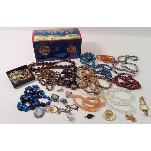 520 - A box of costume jewellery including Tissot watch