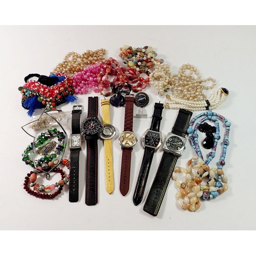 552 - A box of costume jewellery including watches