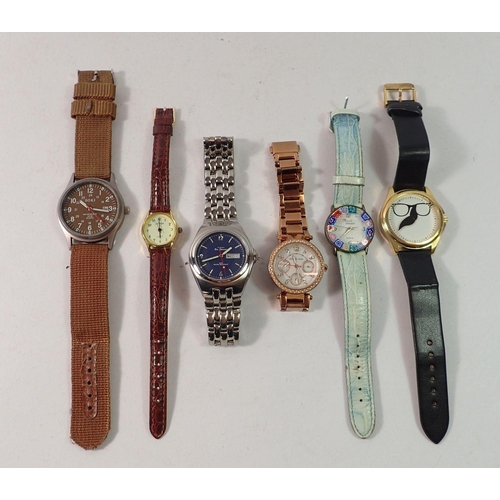 555 - Six assorted quartz watches including Ben Sherman and Michael Kors