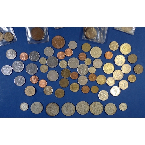 561 - A small collection of British and World coinage, pre-decimal to include silver content half crowns, ... 