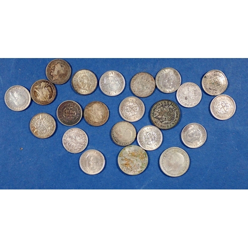 570 - A small collection of British coins to include silver content three pence coins x 19 and six pence x... 