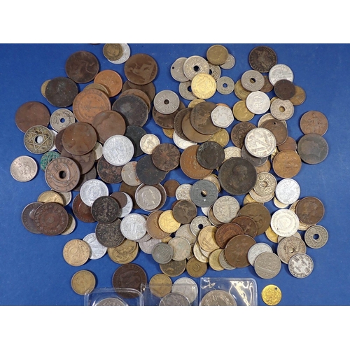 572 - A group of mostly 19th and 20th century British and European coins including French silver conent ap... 