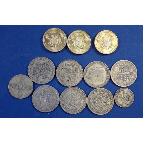 589 - A quantity of British coins including 113g pre 1947 silver content half crowns, florin and shilling,... 