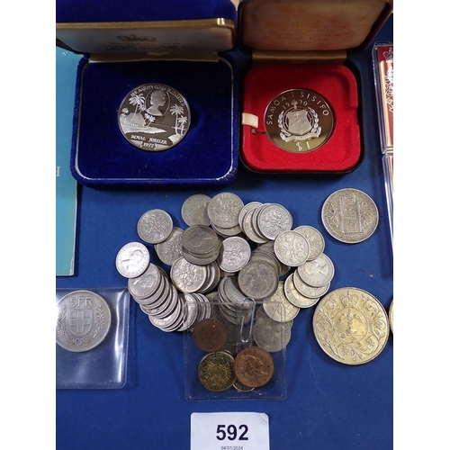 592 - A miscellaneous group of coins including silver proof Western Samoa one tala 1977, 30.7g cased, Roya... 