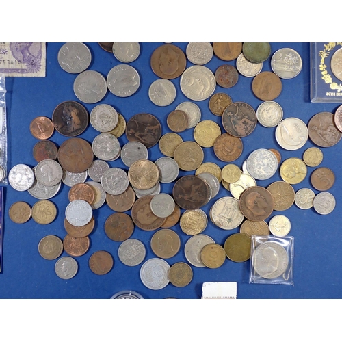 597 - A miscellaneous lot of British and world coinage including fourteen silver content threepence George... 