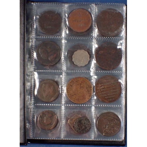 598 - A coin album - combination of mainly copper bronze world coins, tokens and medallions 17th, 18th, 19... 