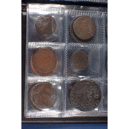 598 - A coin album - combination of mainly copper bronze world coins, tokens and medallions 17th, 18th, 19... 