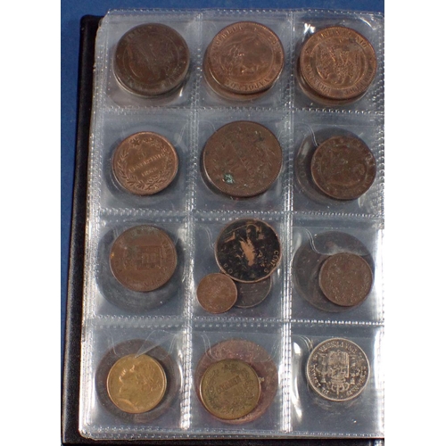 598 - A coin album - combination of mainly copper bronze world coins, tokens and medallions 17th, 18th, 19... 