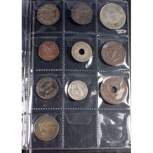 598 - A coin album - combination of mainly copper bronze world coins, tokens and medallions 17th, 18th, 19... 