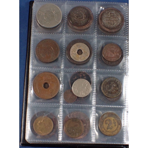 598 - A coin album - combination of mainly copper bronze world coins, tokens and medallions 17th, 18th, 19... 