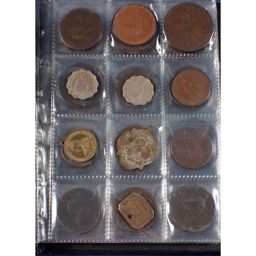 598 - A coin album - combination of mainly copper bronze world coins, tokens and medallions 17th, 18th, 19... 