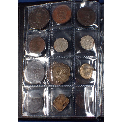 598 - A coin album - combination of mainly copper bronze world coins, tokens and medallions 17th, 18th, 19... 