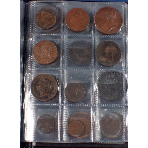 598 - A coin album - combination of mainly copper bronze world coins, tokens and medallions 17th, 18th, 19... 