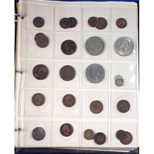 599 - A coin album of British and world coins to include Charles II copper farthing, George IV and William... 