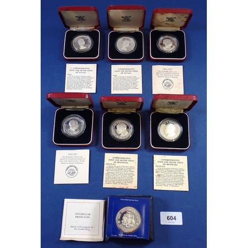 604 - Seven silver proof coins including two Botswana 5 Pulas 1976, two Malawi 10 Kwachas 1975, two Tuvalu... 