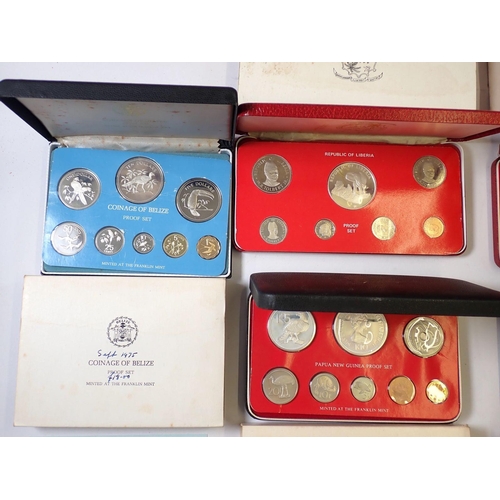 608 - Eight Franklin Mint proof coin sets including Belize 1975 and 1976, Republic of Liberia 196, Republi... 