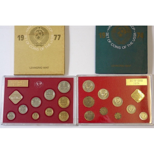 609 - Four Leningrad Mint Coins of The USSR 1974, 1975, 1976 and 1977, each containing nine coins and Leni... 