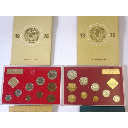 609 - Four Leningrad Mint Coins of The USSR 1974, 1975, 1976 and 1977, each containing nine coins and Leni... 