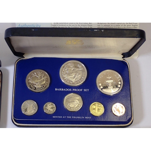 610 - A group of five coin sets including Franklin Mint Guyana 1977 proof set, 10 dollar sterling silver, ... 