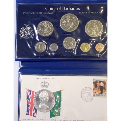 610 - A group of five coin sets including Franklin Mint Guyana 1977 proof set, 10 dollar sterling silver, ... 