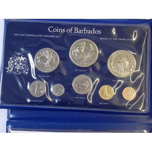 610 - A group of five coin sets including Franklin Mint Guyana 1977 proof set, 10 dollar sterling silver, ... 