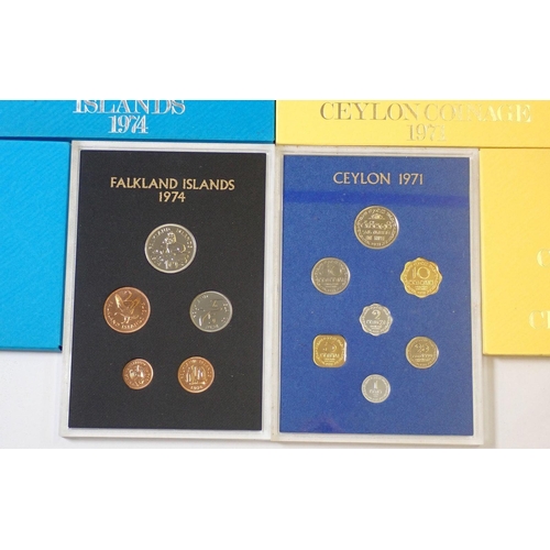 611 - Ten Royal Mint issued coin sets including Falkland Islands 1974 x 5 and Ceylon 1971 x 5, all cased i... 