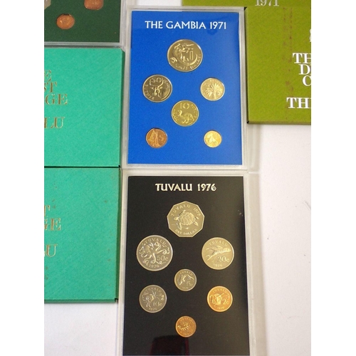 612 - Thirteen Commonwealth coin sets by Royal Mint including Tuvalu 1976 x 2, The Gambia 1971 x 2, Republ... 