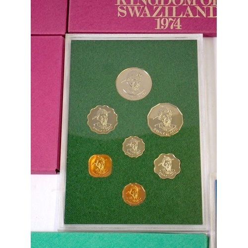 612 - Thirteen Commonwealth coin sets by Royal Mint including Tuvalu 1976 x 2, The Gambia 1971 x 2, Republ... 