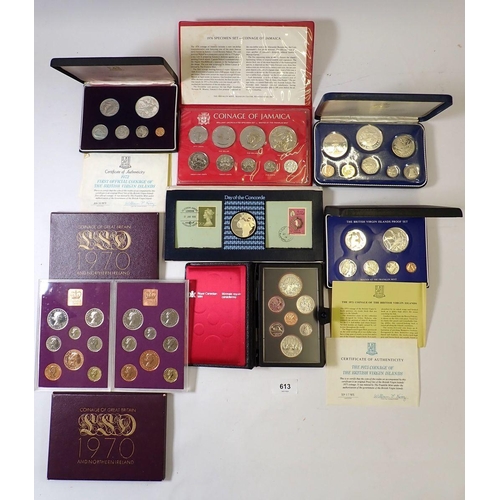 613 - A group of seven coin sets including 1973 & 1975 British Virgin Islands containing silver one dollar... 