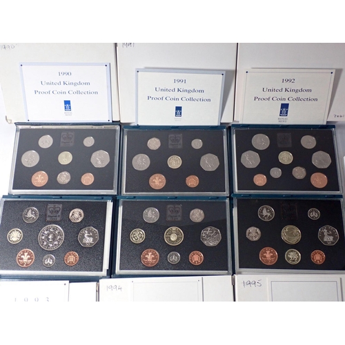 614 - Ten Royal Mint issue United Kingdom proof coin sets, years 1990 - 1999 Cond: Unc