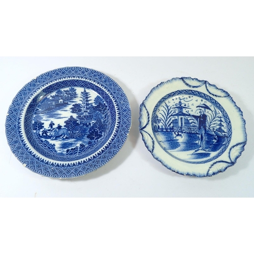 62 - A 19th century Pearlware plate painted Chinese landscape and figure and leaf swag border, 21.5cm dia... 