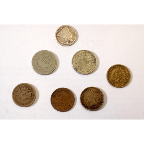 631 - A small group of 19th century USA coins including Indian head one cent 1859 (without shield) 1863, 1... 