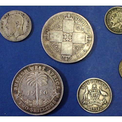 641 - A small group of silver content coins including George III one shilling 1819, Victoria 'Gothic' flor... 