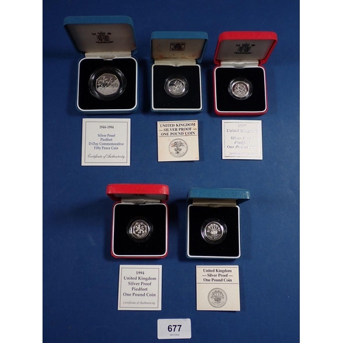 677 - Five Royal Mint issue silver proof coins including 1985 and 1986 one pound coins, 1994 and 1997 pied... 