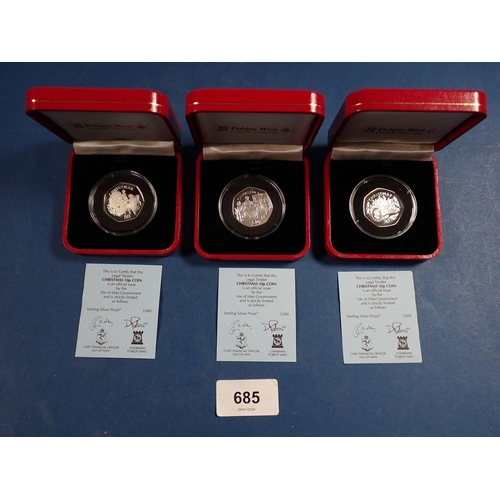 685 - Three Pobjoy Mint Isle of Man silver proof Christmas fifty pences, 1997, 1998 and 1999, all cased Co... 