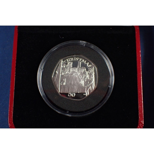 689 - Three Pobjoy Mint Isle of Man silver proof Christmas fifty pences 2000 and 2002 cased plus 2001 moun... 