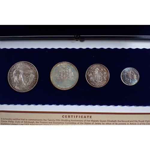 694 - Three Elizabeth II 1972 Jersey Royal Wedding anniversary silver coins sets, four coins in each to in... 