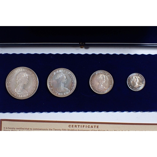 694 - Three Elizabeth II 1972 Jersey Royal Wedding anniversary silver coins sets, four coins in each to in... 