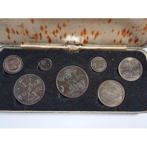 695 - A Victoria Jubilee specimen set 1887 containing seven silver coins in presentation case, total weigh... 