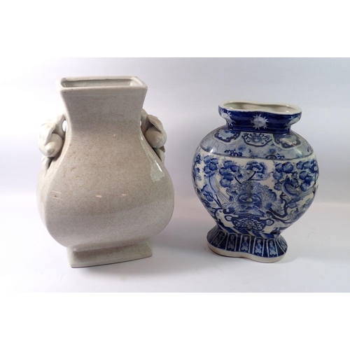 70 - A Chinese blue and white large floral vase, 31cm tall and a crackle glaze one